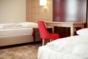 Posteľ alebo postele v izbe v ubytovaní Hotel Raca