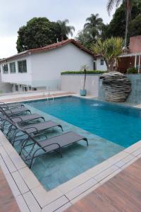 Hồ bơi trong/gần Casa de Temporada Luxo - Piscina, Área Gourmet e Vista Espetacular!