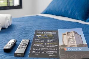 Postel nebo postele na pokoji v ubytování Apartamentos modernos próximo ao Jardim Botanico e à Rodoviária