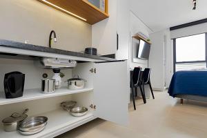 Kuchyň nebo kuchyňský kout v ubytování Apartamentos modernos próximo ao Jardim Botanico e à Rodoviária
