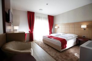 Posteľ alebo postele v izbe v ubytovaní Hotel Raca