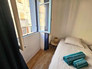 Un ou plusieurs lits dans un hébergement de l'établissement Maison de ville authentique au coeur de Leucate