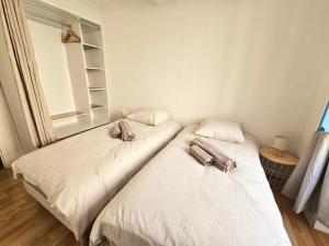 Un ou plusieurs lits dans un hébergement de l'établissement Maison de ville authentique au coeur de Leucate