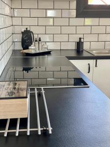 Kuchyň nebo kuchyňský kout v ubytování Casa Posidonia + 22 fotografií