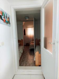 Postel nebo postele na pokoji v ubytování Vikendica Drinski mir