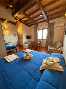 A bed or beds in a room at B&B Da Luca