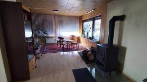 Khu vực ghế ngồi tại Ferienhaus mit Charme am Rennsteig - mit Sauna&Holzofen