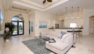 a living room with a couch and a table at Shenandoah in Marco Island