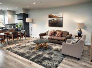 a living room with a couch and a table at Hollywood Homes Free parking close to all things LA in Los Angeles