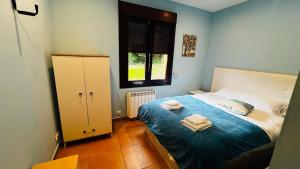 Postel nebo postele na pokoji v ubytování Casa Simona