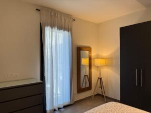 En eller flere senge i et værelse på Dimora degli Ulivi + 17 billeder