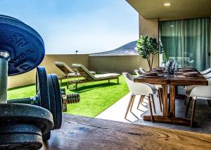 Posezení v ubytování ENJOYTHEMOMENT Sotavento Suites
