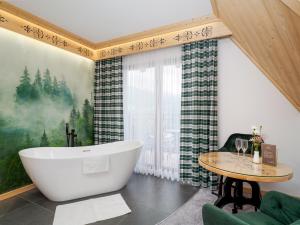 Fotografia z galérie ubytovania Apartamenty Małe Ciche z jacuzzi ogrodowym, widokiem na TATRY i SKY WALK v destinácii Ciche Małe