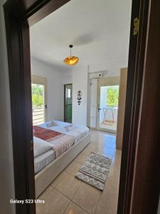 Giường trong phòng chung tại Vacation Home