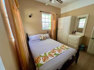 Voodi või voodid majutusasutuse Lovely and cozy 2 bedroom apt with oceanic view toas