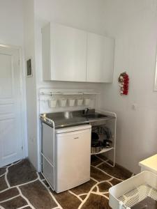 Una cocina o cocineta en islanderhouse77