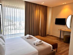 Postel nebo postele na pokoji v ubytování Avenue Hotel + 37 fotografií