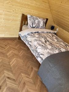 Postel nebo postele na pokoji v ubytování Noclegi Bieszczady, Domki na Bani