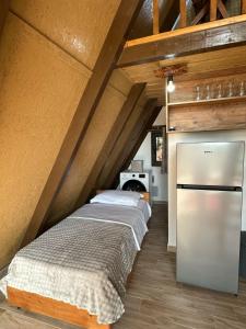 Kuchyň nebo kuchyňský kout v ubytování Rent Cabin Miri