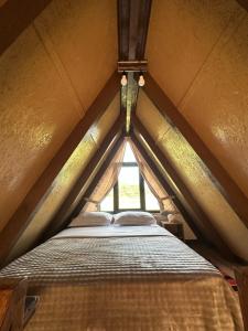 Postel nebo postele na pokoji v ubytování Rent Cabin Miri