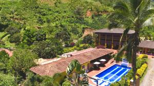 Bazén v ubytování Hotel Campestre la Playa nebo v jeho okolí