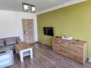 a living room with a couch and a tv at apt Maria in Medzilaborce