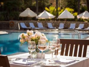 The swimming pool at or close to Hotel Cala Sant Vicenç - Adults Only