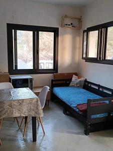 Ένα ή περισσότερα κρεβάτια σε δωμάτιο στο Apartment with panoramic view in Arginonta 52 m²