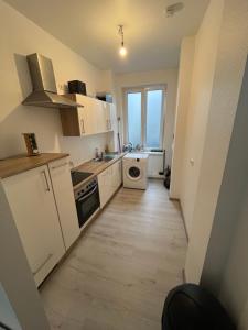 Nhà bếp/bếp nhỏ tại Modernes City Apartment am Limbecker Platz Essen