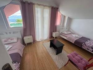Katil atau katil-katil dalam bilik di Holiday Village Ostrog