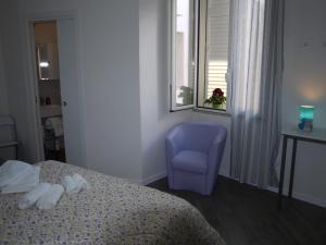 Postel nebo postele na pokoji v ubytování Dafne Marsala Centro