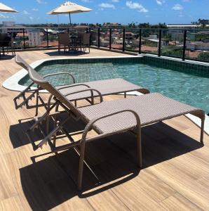 Πισίνα στο ή κοντά στο LocFlat106 Porto de Galinhas no centro 5min praia