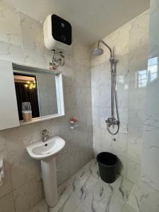 Koupelna v ubytování Serenity Suites