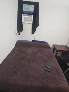 Ένα ή περισσότερα κρεβάτια σε δωμάτιο στο Grateful Hemphill C +8 φωτογραφίες