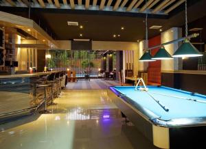 a pool table in a room with a bar at Nagoya Mansion Apart Trw B in Nagoya