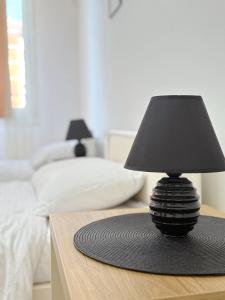 Postel nebo postele na pokoji v ubytování Maribelle Apartments