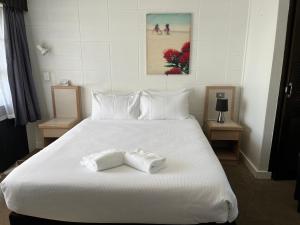 Voodi või voodid majutusasutuse Rotorua Motel toas
