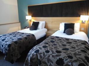 Postel nebo postele na pokoji v ubytování Park Hotel