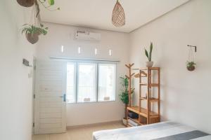 Postel nebo postele na pokoji v ubytování Indonesia Eco Tour Homestay