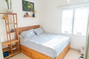 Postel nebo postele na pokoji v ubytování Indonesia Eco Tour Homestay