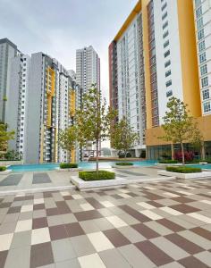 a courtyard in a city with tall buildings at Studio at Mesahill Nilai by D'KAY HOMES with Mall, near USIM KLIA in Nilai
