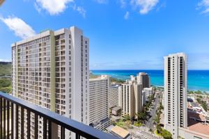 a view of the ocean from the balcony of a building at Sky-High Oceanview Escape at Waikiki Banyan with Free Parking (23214) in Honolulu
