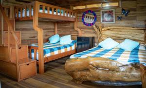 Postel nebo postele na pokoji v ubytování Hospedaje Casona Villa Alicia