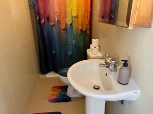 Koupelna v ubytování Bohemian suite penthouse close to Sliema and Valletta