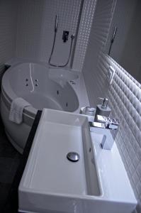 Vannituba majutusasutuses Apartments Good Night