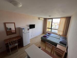 A television and/or entertainment centre at Julia Vigo Panorama apartments