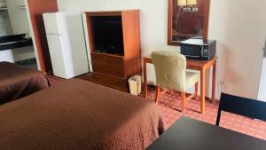 Kuchyň nebo kuchyňský kout v ubytování Executive Inn Robstown