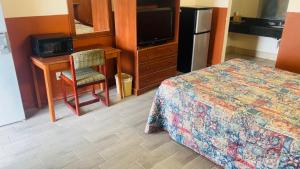 Kuchyň nebo kuchyňský kout v ubytování Executive Inn Robstown