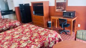 Kuchyň nebo kuchyňský kout v ubytování Executive Inn Robstown