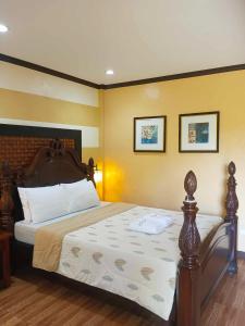 a bedroom with a large bed in a room at La Traviesa Hotel Resort in General Trias +36 photos